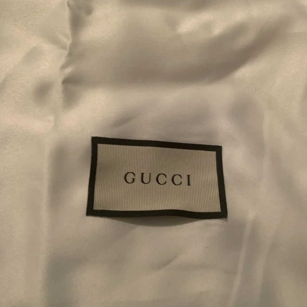 Preloved‎ Gucci dustbag. About 14x8.5 inches